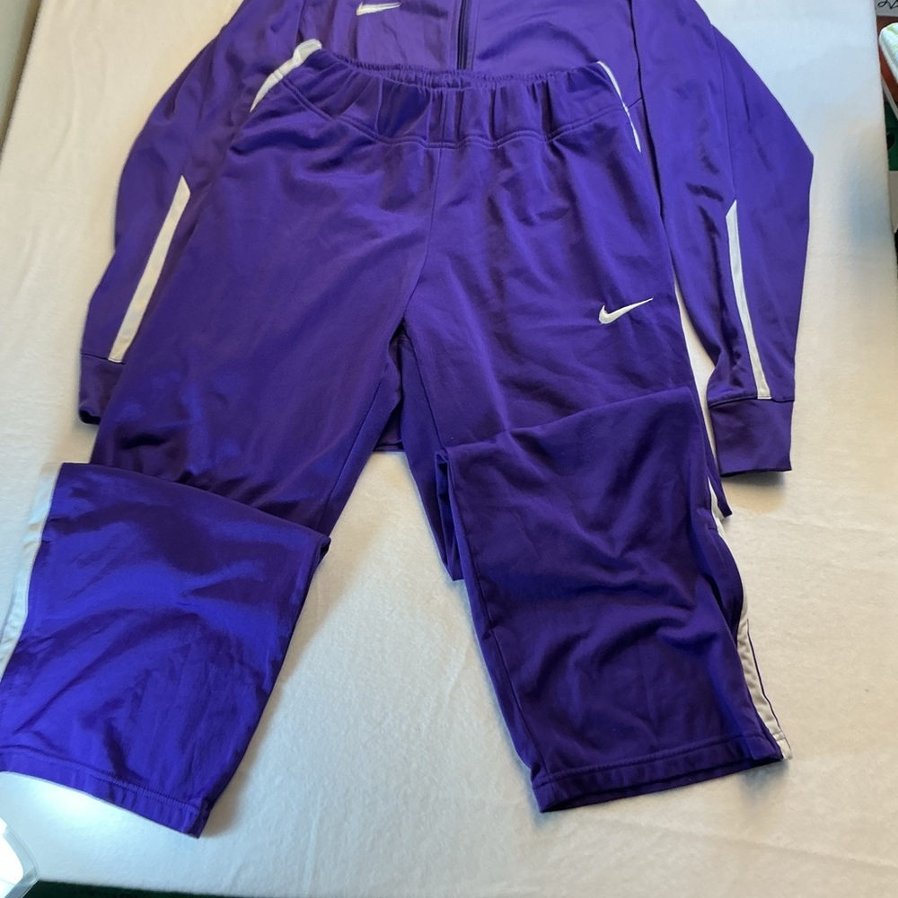 Nike women’s size Medium Purple Track Pants and purple jacket with white 0259